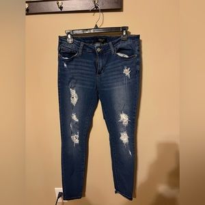 Skinny fit with distressing on front. Size 13/31